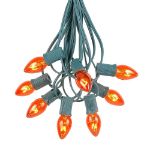 100 C7 String Light Set with Orange Bulbs on Green Wire