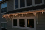 Clear 100 Light Icicle Lights Green Wire Long Drops