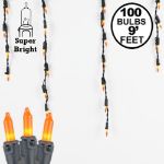 Frosted Orange 100 Light Icicle Lights Black Wire Medium Drops