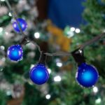 25 G40 Globe String Light Set with Blue Satin Bulbs on Black Wire