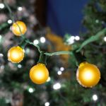100 G40 Globe String Light Set with Yellow Bulbs on Green Wire