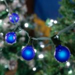 25 G40 Globe String Light Set with Blue Satin Bulbs on Green Wire