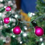 25 G40 Globe String Light Set with Pink Satin Bulbs on Green Wire