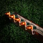100 C9 Christmas Light Set - Orange Bulbs - Green Wire