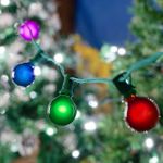 25 G40 Globe String Light Set with Multi-Colored Satin Bulbs on Green Wire